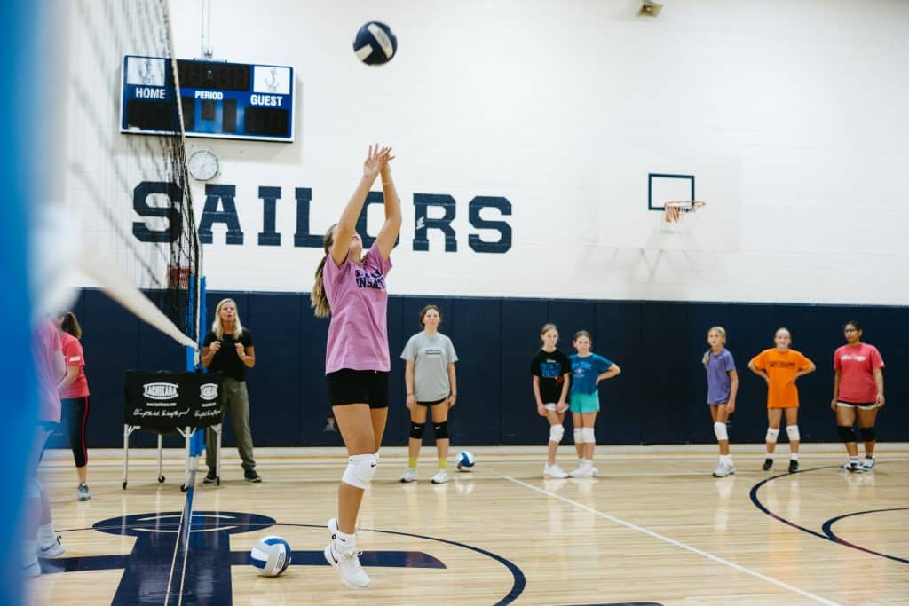 Girls playing volleyball