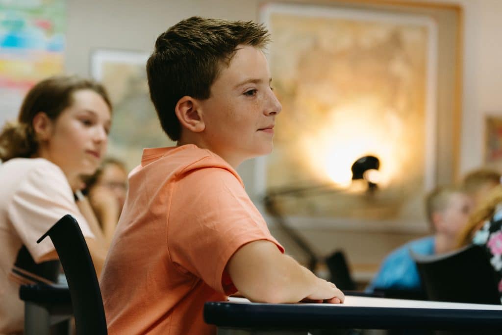 Students in classroom engaging in discussion