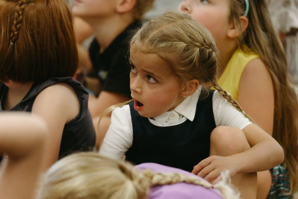 Students in classroom engaging in discussion